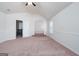 Spacious bedroom with vaulted ceiling and carpeting at 160 Traditions Ln, Hampton, GA 30228