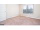 Well-lit bedroom with a large window and neutral walls at 160 Traditions Ln, Hampton, GA 30228