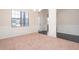 Bright dining room with neutral walls and carpeting at 160 Traditions Ln, Hampton, GA 30228
