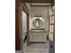 Well-lit bathroom featuring vanity with granite countertop, subway tile flooring and a toilet at 213 W Hightower Trl, Social Circle, GA 30025