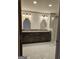 Bathroom featuring a double sink vanity with marble countertops at 213 W Hightower Trl, Social Circle, GA 30025