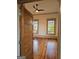 Bedroom with hardwood floors and large windows at 213 W Hightower Trl, Social Circle, GA 30025