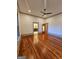 Spacious bedroom featuring stained hardwood floors and neutral paint scheme at 213 W Hightower Trl, Social Circle, GA 30025