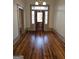 Spacious entryway with hardwood floors and an ornate door at 213 W Hightower Trl, Social Circle, GA 30025