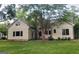 Charming single Gathering home featuring a well-manicured lawn and inviting facade at 213 W Hightower Trl, Social Circle, GA 30025