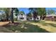 Charming light yellow home with well-maintained lawn and several windows at 213 W Hightower Trl, Social Circle, GA 30025
