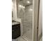 A glass enclosed walk-in shower in this bathroom at 213 W Hightower Trl, Social Circle, GA 30025