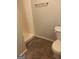 Full bathroom featuring stand up shower, toilet and vinyl flooring at 1276 Turner Church Rd, Mcdonough, GA 30252