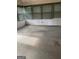 Sunroom with carpet flooring and window blinds at 1276 Turner Church Rd, Mcdonough, GA 30252