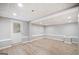 Unfinished basement with vinyl flooring and recessed lighting at 2141 Colony Dr, Canton, GA 30114