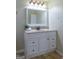 Classic bathroom vanity with a wide mirror, providing ample storage and a clean, organized space at 108 Turnberry Trce, Sharpsburg, GA 30277