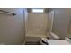 Bathroom with shower/tub combo, toilet, and vinyl flooring at 6627 Coventry Pt, Austell, GA 30168