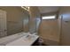 Bathroom with tub, shower, and updated vanity at 6627 Coventry Pt, Austell, GA 30168