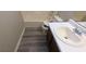 Bathroom with single sink vanity, toilet, and bathtub at 6627 Coventry Pt, Austell, GA 30168