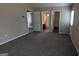 Large bedroom with access to bathroom and closet at 6627 Coventry Pt, Austell, GA 30168