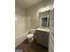 Bathroom with shower-tub combination, sleek vanity, and modern fixtures at 142 Asa Moseley Rd, Mcdonough, GA 30252
