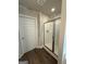 Shower with a sliding glass door and a door to the rest of the home at 142 Asa Moseley Rd, Mcdonough, GA 30252