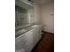 Bathroom featuring a dual vanity with granite countertops and modern fixtures at 142 Asa Moseley Rd, Mcdonough, GA 30252
