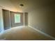 Bedroom featuring a window that offers natural light at 142 Asa Moseley Rd, Mcdonough, GA 30252