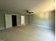 Spacious room with ceiling fan and open doorway to another room or ensuite bathroom at 142 Asa Moseley Rd, Mcdonough, GA 30252