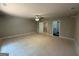 Spacious bedroom with a ceiling fan and neutral walls, offering a blank canvas for personalization at 142 Asa Moseley Rd, Mcdonough, GA 30252