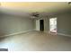 Spacious room with ceiling fan and open doorway to another room or ensuite bathroom at 142 Asa Moseley Rd, Mcdonough, GA 30252