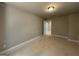 A simple bedroom with neutral walls and trim, with a door to an adjacent room at 142 Asa Moseley Rd, Mcdonough, GA 30252