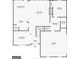Detailed first floor plan showing the layout of the kitchen, living room, and garage at 142 Asa Moseley Rd, Mcdonough, GA 30252