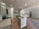 Stylish kitchen with gray cabinets, granite countertops, and an open layout, perfect for cooking and entertaining at 142 Asa Moseley Rd, Mcdonough, GA 30252