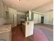 Kitchen with modern grey cabinets, granite countertops, and an open layout, perfect for cooking and entertaining at 142 Asa Moseley Rd, Mcdonough, GA 30252