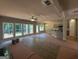 Spacious living room with large windows offering natural light, neutral paint colors and an open layout at 142 Asa Moseley Rd, Mcdonough, GA 30252