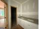 Bright bathroom featuring a double vanity with a granite countertop at 150 Asa Moseley Rd, Mcdonough, GA 30252