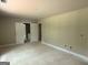 Spacious bedroom with ensuite bathroom and neutral paint, ready for personalization at 150 Asa Moseley Rd, Mcdonough, GA 30252