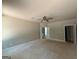Spacious bedroom featuring a ceiling fan and double doors at 150 Asa Moseley Rd, Mcdonough, GA 30252