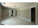 Spacious bedroom featuring double doors and access to a bathroom at 150 Asa Moseley Rd, Mcdonough, GA 30252