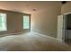 Bright bedroom with large windows offering natural light and unfinished floors at 150 Asa Moseley Rd, Mcdonough, GA 30252