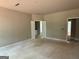 Spacious bedroom with ensuite bathroom and neutral paint, ready for personalization at 150 Asa Moseley Rd, Mcdonough, GA 30252