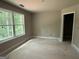 Bedroom with large window and green views at 150 Asa Moseley Rd, Mcdonough, GA 30252