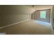 Attic bedroom featuring a window and sloped ceilings at 150 Asa Moseley Rd, Mcdonough, GA 30252