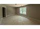 An unfinished attic bedroom featuring a window at 150 Asa Moseley Rd, Mcdonough, GA 30252