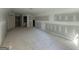 Large bonus room features unfinished walls and ceilings with multiple entryways at 150 Asa Moseley Rd, Mcdonough, GA 30252