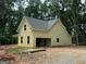 A new construction two story home with a spacious garage in a wooded setting at 150 Asa Moseley Rd, Mcdonough, GA 30252