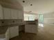 Open kitchen with granite countertops, abundant storage, and an easy flow to the living spaces at 150 Asa Moseley Rd, Mcdonough, GA 30252