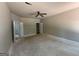 Spacious main bedroom features neutral paint and a ceiling fan at 150 Asa Moseley Rd, Mcdonough, GA 30252