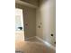 Room with open door and unfinished floors, ready for your personal touch at 150 Asa Moseley Rd, Mcdonough, GA 30252