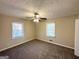 Spacious bedroom with neutral decor and ample natural light at 3006 Remington St, East Point, GA 30344