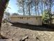 Back of the house showing a side view and sloped backyard at 3006 Remington St, East Point, GA 30344