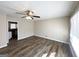 Bright living room featuring hardwood floors and a ceiling fan at 3006 Remington St, East Point, GA 30344