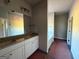 Bathroom with double vanity sink, granite countertops, and full bathtub at 136 Asa Moseley Rd, Mcdonough, GA 30252