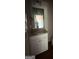 Bathroom vanity with granite countertop, sink and view into adjacent room at 136 Asa Moseley Rd, Mcdonough, GA 30252